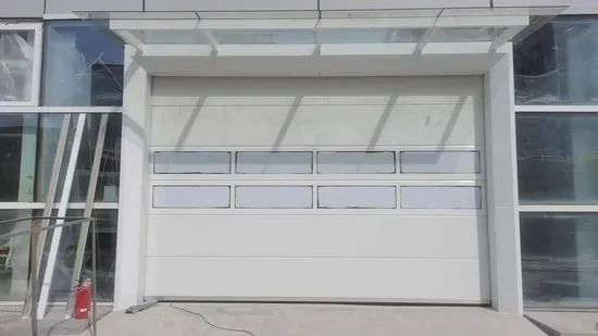 ซื้อ Industrial Sectional Door with AC 220V-240V Motor 2.0mm Galvanized Steel Track and Low Stress Oil Tempered Torsion Springs online manufacture